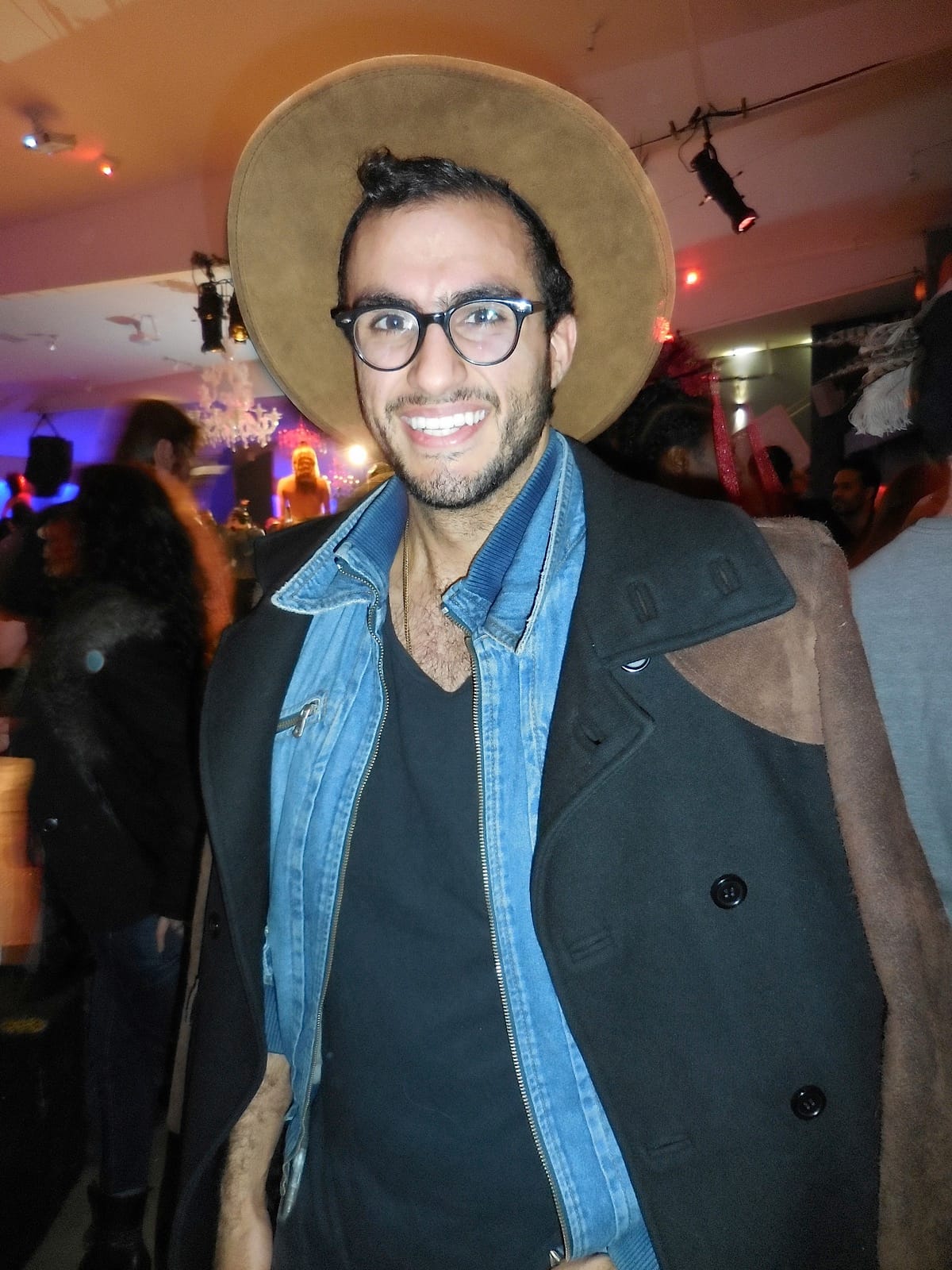 Designer Alexandre Dorriz takes a well deserved break from the show for a quick photo op.