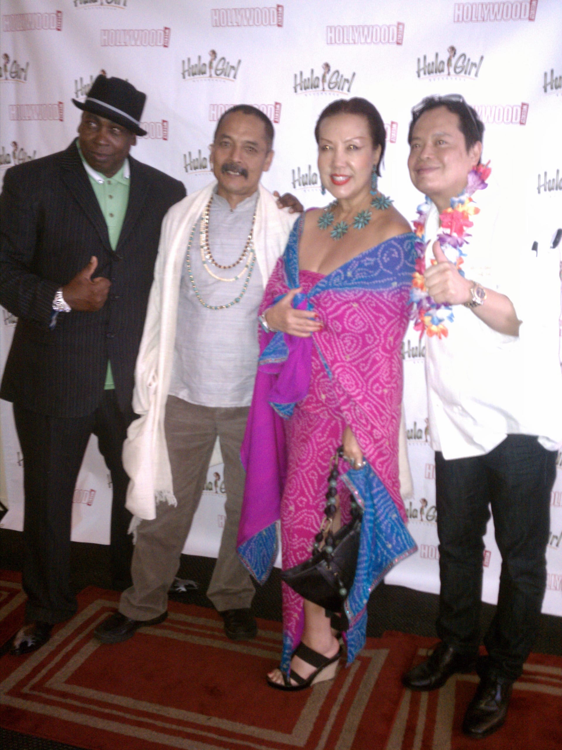 Two thumbs up...BJ Drake with Master Romio, fashion designer Sue Wong and Chef Jack Lee