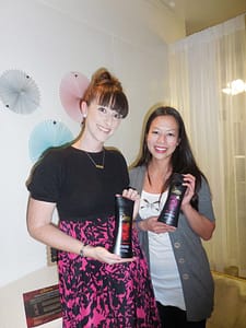 Bri and Beatrice of Baby Bea's Bakery hold Caress body washes. Caress was one of the event sponsors. Photo courtesy of Vida G.