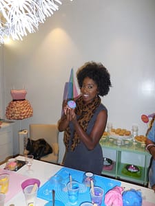 Ashley Baline Featherson proudly shows her artistic cupcake creation. Photo courtesy of Vida G.