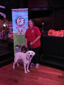 Woman's best friend...Adele Kaufman, owner of Camp Run-A-Mutt with CUSTOS. Photo courtesy of Vida G.