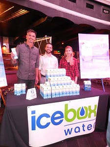 Michael Kaliski of Good Planet with Mathew Salvetti and Tina Trznadu at the Icebox water booth. Photo courtesy of Vida G.