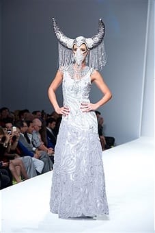 A model with an elaborate headdress and beautiful gown makes for the ultimate siren. Photo courtesy of Earl Gibson III/Wireimage