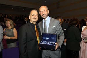 Noor Film Festival Founder and Director Siamak Ghahremani with acclaimed actor Shaun Toub and Shaun's Lifetime achievement award. Photo courtesy of John Fuentes Photography