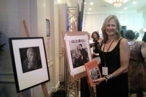 Photographer Dana Gluckstein proudly displays her compelling photos and photography book on the legendary Nelson Mandela.