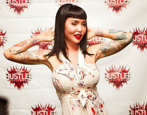 Masuimi strikes a sexy pose pinup pose on the red carpet. Photo courtesy of Photos by Ana J.
