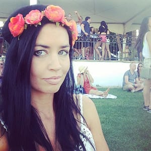 Pic with Flower Headband: The Experience contributor, Liz Fraley relaxes in the VIP area at Coachella during a stage performance by Yelle