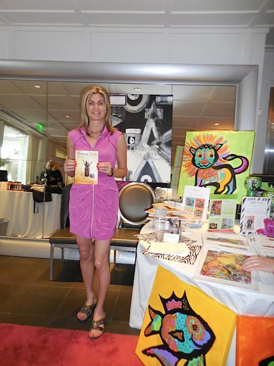 Dr. Lana Marconi with her book