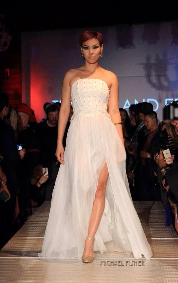 Werk it...Stunning model is a vision in a white Thomas and Edison gown. Photo courtesy of Michael Fisher