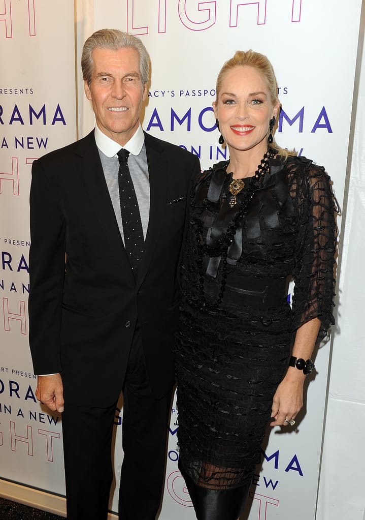 LOS ANGELES, CA - SEPTEMBER 12: Actress Sharon Stone (R) and CEO, Chairman of the Board, President, and Director at Macy's, Inc. Terry Lundgren attends Glamorama "Fashion in a New Light" benefiting AIDS Project Los Angeles presented by Macy's Passport at Orpheum Theatre on September 12, 2013 in Los Angeles, California. (Photo by Kevin Winter/Getty Images for Macy's)