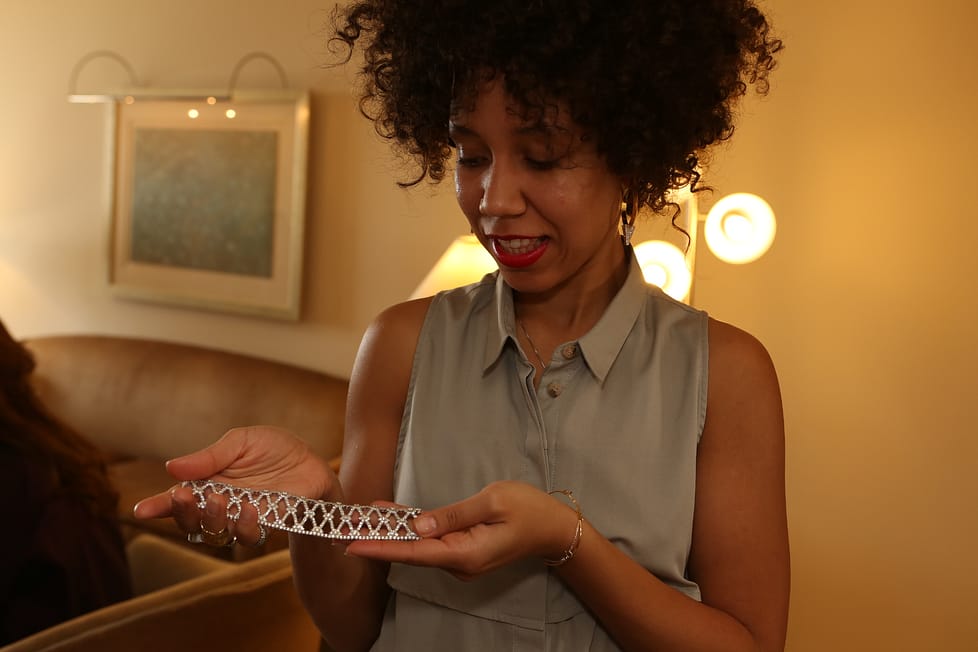 And the award for most sparkle goes to...An attendee checks out a stunning bracelet