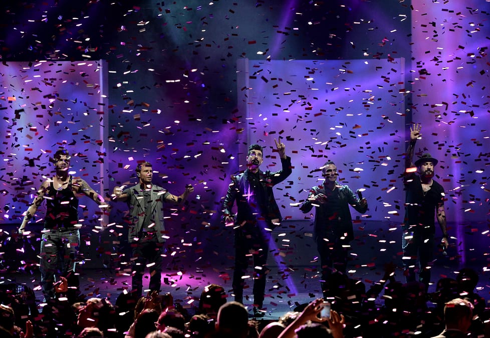 LOS ANGELES, CA - SEPTEMBER 12: Singers Nick Carter, Brian Littrell, Kevin Richardson, Howie Dorough, and AJ McLean of The Backstreet Boys perform onstage during Glamorama "Fashion in a New Light" benefiting AIDS Project Los Angeles presented by Macy's Passport at Orpheum Theatre on September 12, 2013 in Los Angeles, California. (Photo by Kevin Winter/Getty Images for Macy's)